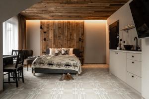 Posteľ alebo postele v izbe v ubytovaní ApartSki 18d