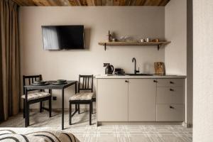 Kuchyňa alebo kuchynka v ubytovaní ApartSki 18d