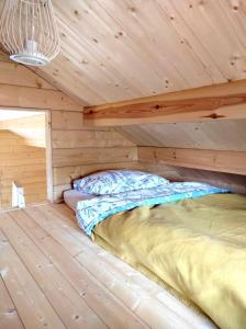 Un ou plusieurs lits dans un hébergement de l'établissement Les Chalets de Parly