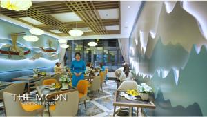 a rendering of the mcu omni hotel restaurant at The Moon Boutique Hotel Cat Ba in Cat Ba