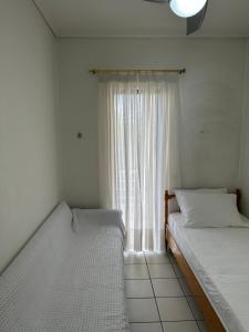 Postel nebo postele na pokoji v ubytování Ocean View