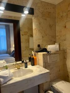 Voodi või voodid majutusasutuse Park Hotel & Vinbar toas