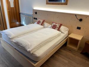 Ein Bett oder Betten in einem Zimmer der Unterkunft Tilde