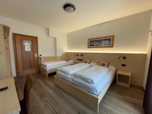 Ein Bett oder Betten in einem Zimmer der Unterkunft Tilde