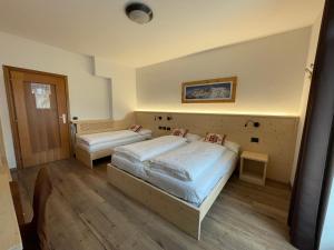 Ein Bett oder Betten in einem Zimmer der Unterkunft Tilde