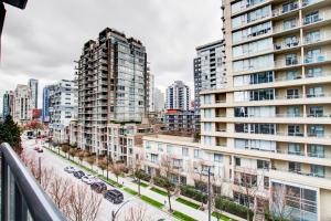 a view of a city with tall buildings at LuxeStay in Vancouver