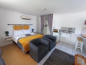 En eller flere senge i et værelse på NoulAnouk's Corner - Peaceful Studio