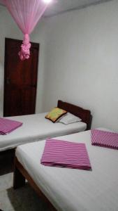 Cama o camas de una habitación en Tree Cool Resort