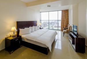Katil atau katil-katil dalam bilik di Black Diamond Hotel