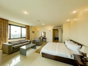 Katil atau katil-katil dalam bilik di Black Diamond Hotel