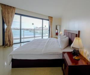 Katil atau katil-katil dalam bilik di Black Diamond Hotel