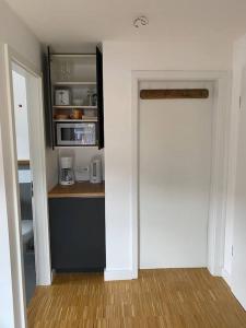 Η κουζίνα ή μικρή κουζίνα στο Modernes Apartment in Hammersbach / Grainau