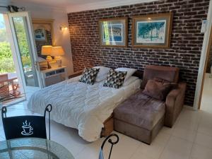 Posezení v ubytování Le mas de Phil + 15 fotografií