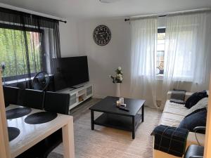 TV a/nebo společenská místnost v ubytování Bli Hel