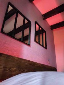 Postel nebo postele na pokoji v ubytování GITE Chambre SPA Privé DE L'ANCIENNE FERME