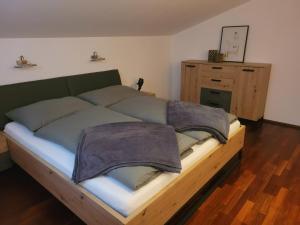 Postel nebo postele na pokoji v ubytování Appartement Lockei