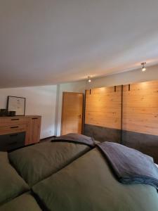 Postel nebo postele na pokoji v ubytování Appartement Lockei