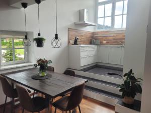 Kuchyň nebo kuchyňský kout v ubytování Appartement Lockei