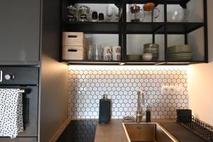 Kuchyň nebo kuchyňský kout v ubytování Apartmán s krbom vedľa Zubačky