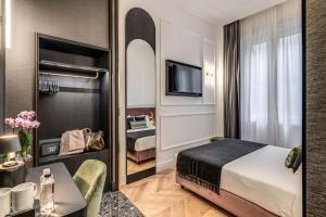 Residenza Piranesi Boutique Hotel客房内的一张或多张床位