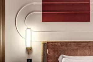 Ένα ή περισσότερα κρεβάτια σε δωμάτιο στο THE STEPS Hotel - by Eitch Collection