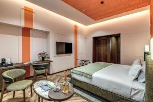 Ένα ή περισσότερα κρεβάτια σε δωμάτιο στο THE STEPS Hotel - by Eitch Collection