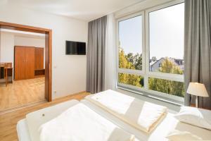 Postel nebo postele na pokoji v ubytování Hotel Meridian ***superior