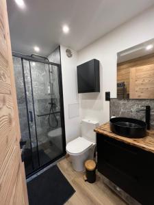 Bathroom sa La Marmotte Duplex 4 p. entièrement rénové avec vue magnifique