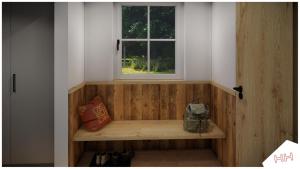 a wooden bench in a room with a window at Oberwinklgut in Bischofshofen