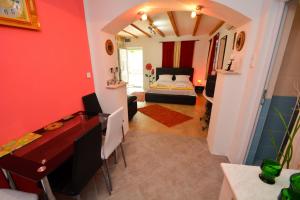 Postel nebo postele na pokoji v ubytování Apartments Krivokapic