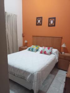 Ένα ή περισσότερα κρεβάτια σε δωμάτιο στο Casa Arenales +5 φωτογραφίες