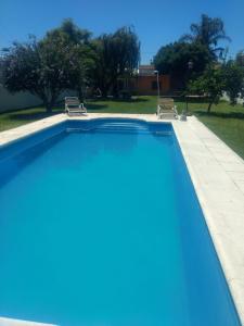 Πισίνα στο ή κοντά στο Casa Arenales