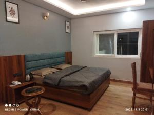 Oleskelutila majoituspaikassa Hotel Mahadev Rishikesh