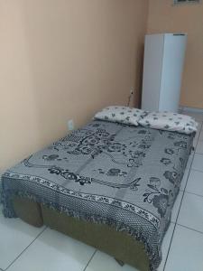 Voodi või voodid majutusasutuse Kitnets Coroa Vermelha toas