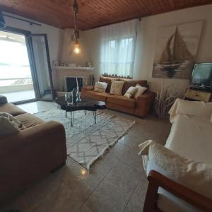 Posezení v ubytování Beach House Onar