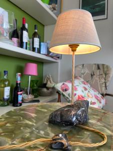 a lamp sitting on top of a table at Seven boutique hotel in Sestri Levante