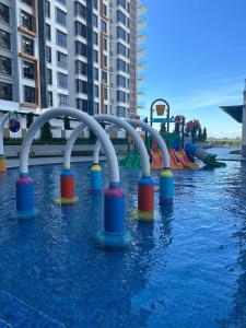 a water park with a row of water slides at K Avenue Seaview Nearby Kota Kinabalu Airport in Kota Kinabalu