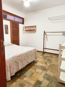 Lova arba lovos apgyvendinimo įstaigoje Casa Aberta