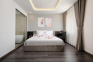 Postelja oz. postelje v sobi nastanitve Mercy Emerald Hotel