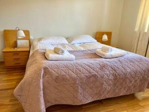 Postel nebo postele na pokoji v ubytování KEF Spacious & comfi appartment