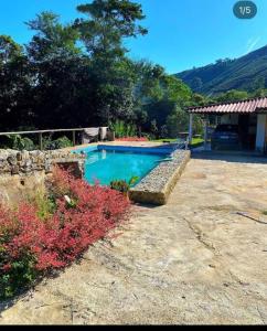Πισίνα στο ή κοντά στο Chácara Rancho da Mata