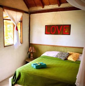 Voodi või voodid majutusasutuse Hostal Los Orishas toas