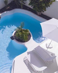 Bazén v ubytovaní Villa Tiguaro Piscina Climat Jacuzzy AC Villa 9 12 alebo v jeho blízkosti