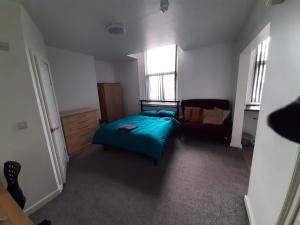 Ein Bett oder Betten in einem Zimmer der Unterkunft Exclusive Self-contained flat in Middlesbrough