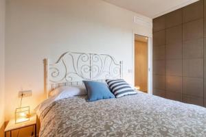 Ένα ή περισσότερα κρεβάτια σε δωμάτιο στο Terrazza Panoramica Privata