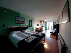 Rúm í herbergi á Hestia - Hotel, Wine and View