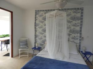 Postel nebo postele na pokoji v ubytování REVE BLEU - Villa classée 4* vue mer - 6 pers