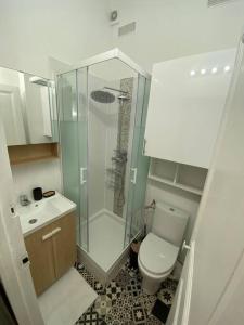 Een badkamer bij Appartement cosy 10 min stade de France