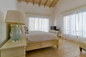 Postel nebo postele na pokoji v ubytování Lujosa Villa en Las Terrenas, Samaná