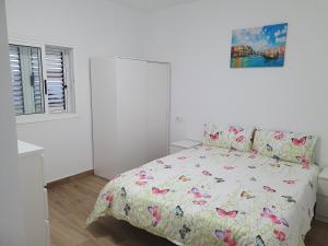 Ένα ή περισσότερα κρεβάτια σε δωμάτιο στο Casita isabelita